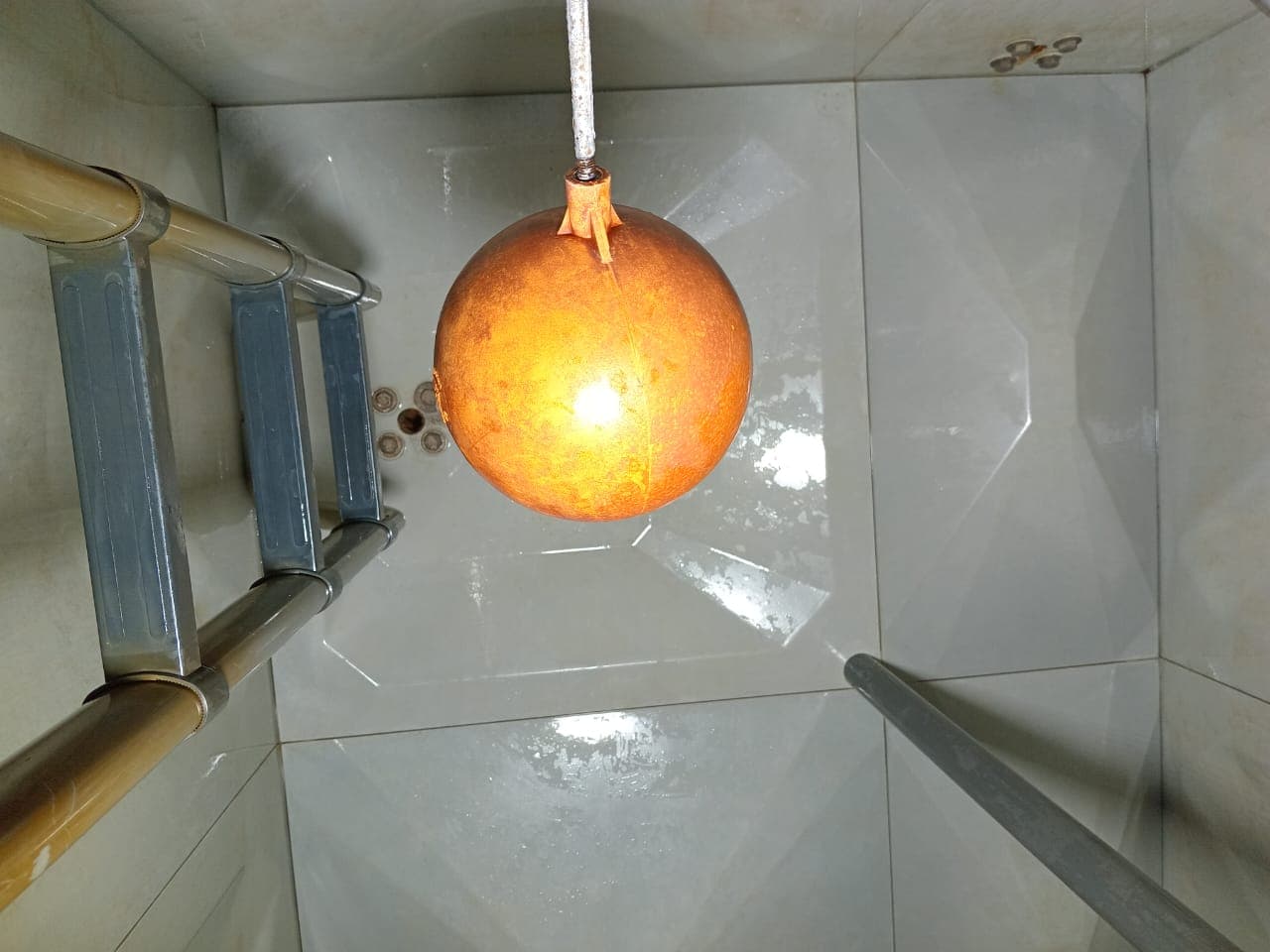 Main tank interior after cleaning — completely clear walls and floor, all sediment removed